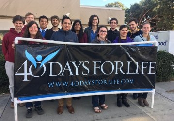 Students hold 40 Days for Life banner