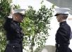 Alumnus Presents Graduate with Marine Corps Commission