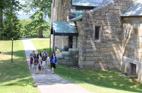 Students walk by chapel