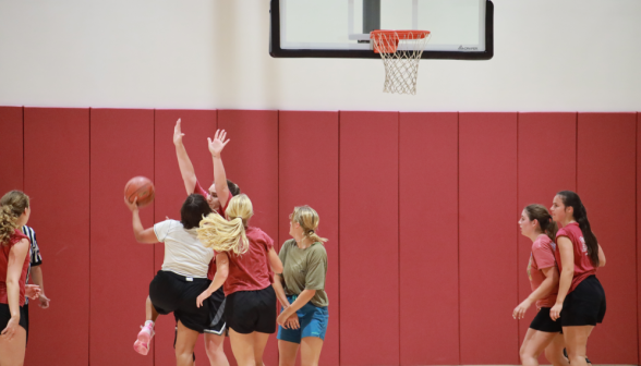 Red Team blocks an attempted basket