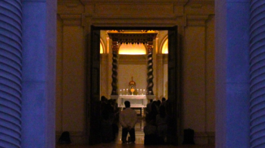 View through the Chapel doors: students pray before the exposed Sacrament