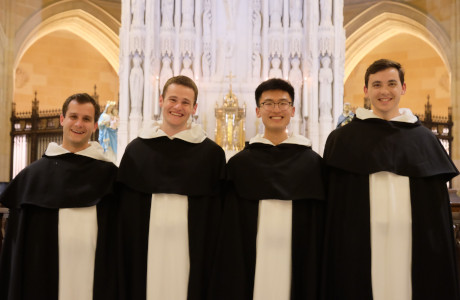 New Dominican novices, including Br. Michael Thomas Cain (’18, second from left) and Br. Kevin Peter Cantu (’15, right)