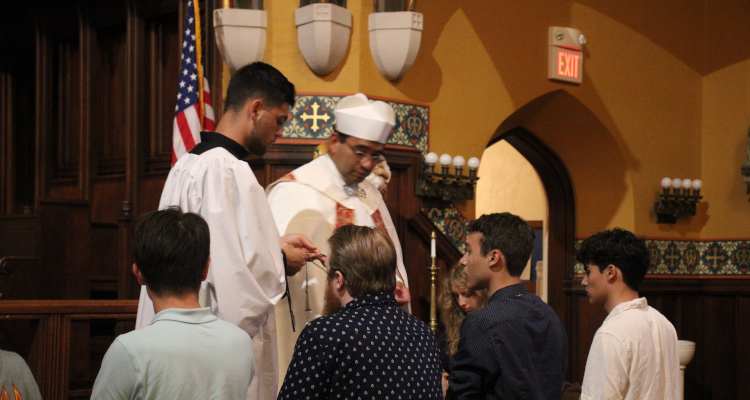 Fr. Miguel enrolls the students