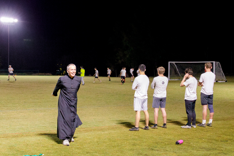 Head Chaplain Rev. Robert Marczewski celebrates Team MacKinnon’s victory — and his own successful prediction.