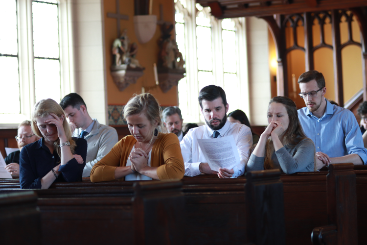 Students pray in Chapel