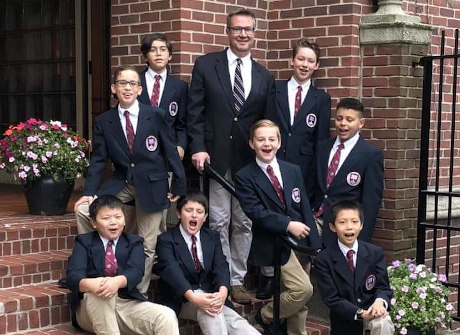 Eric Maurer (’98) with some of his students at St. Paul’s Ch