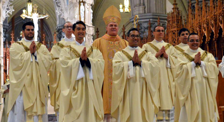 Fr. Seo, to the left of Cardinal Tobin, with his fellow newl