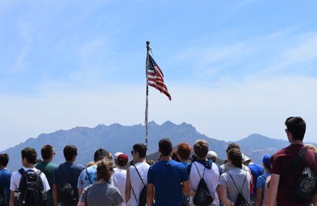 Students at the flag atop Mugu Peak