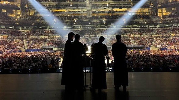 Floriania signs at the National Eucharistic Congress