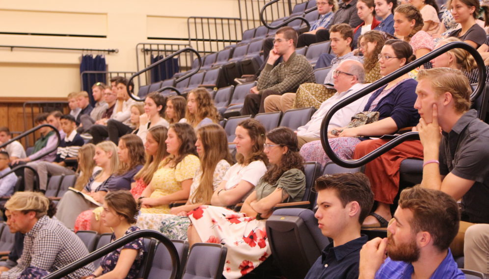 Students fill the auditorium for orientation lectures
