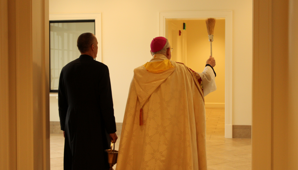 The Archbishop blesses the foyer
