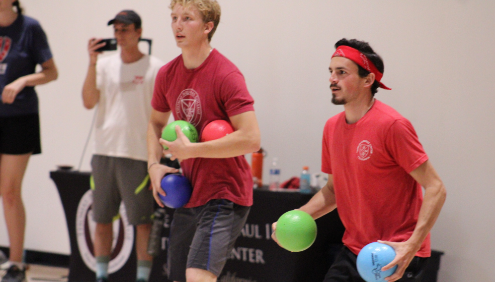 Students with dodgeballs ready to throw