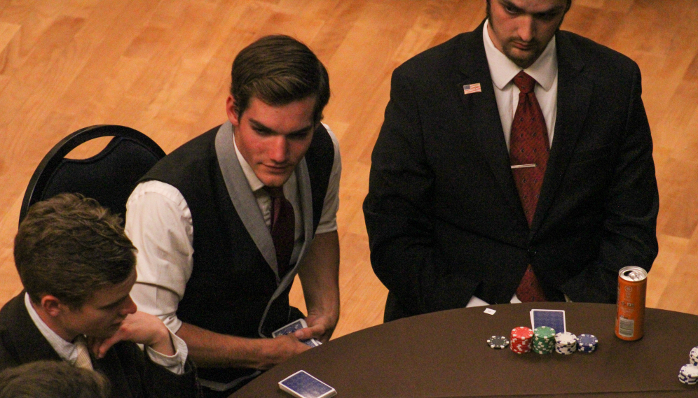 Poker players at one of the tables