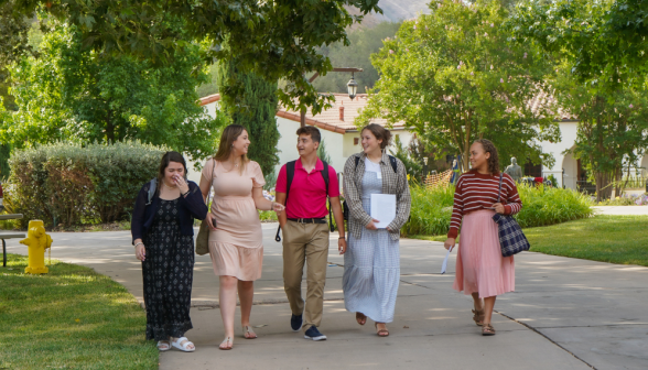 Students walk along academic quadrangle