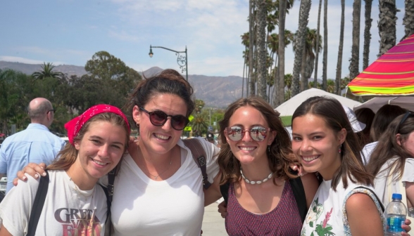 Four pose together for a picture in Santa Barbara