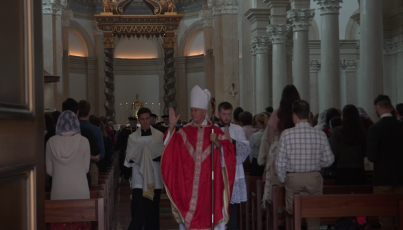 The bishop recedes, blessing the congregation