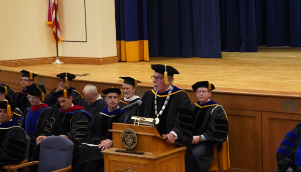 Dr. McLean addresses the assembled student body
