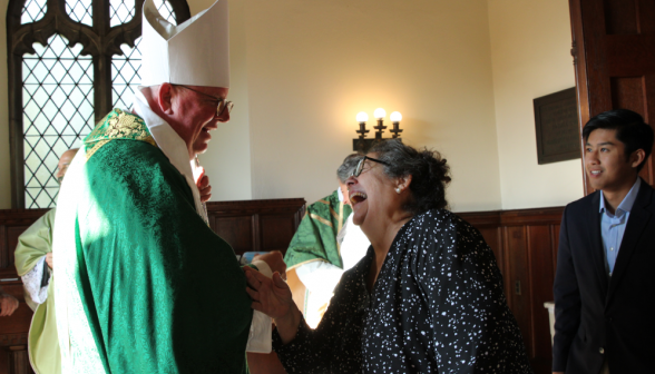 The Bishop chats with Mrs. Laura Grimm