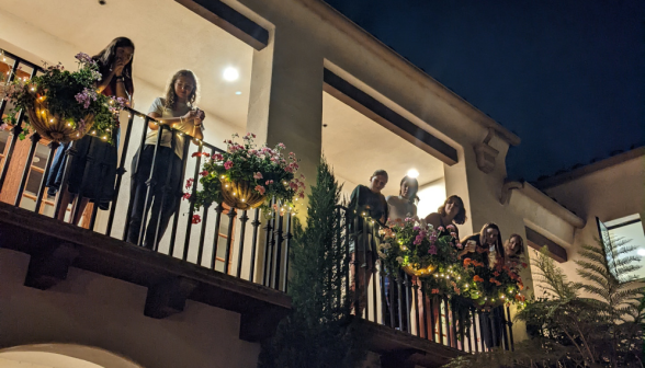 Spectators observe from the balconies above