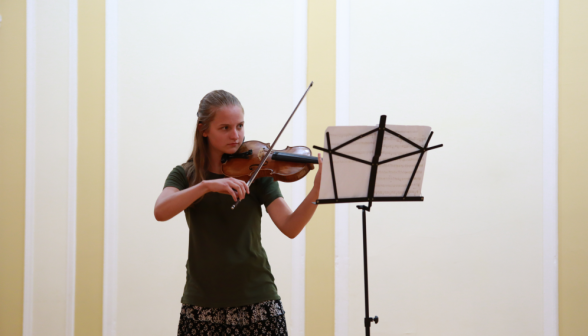A student plays the violin