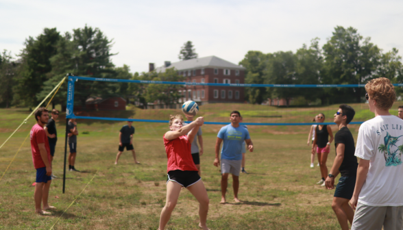 Volleyball: a student hits the ball