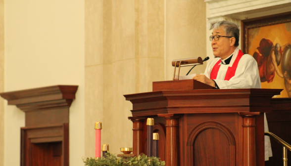 Fr. Chung speaks from the pulpit