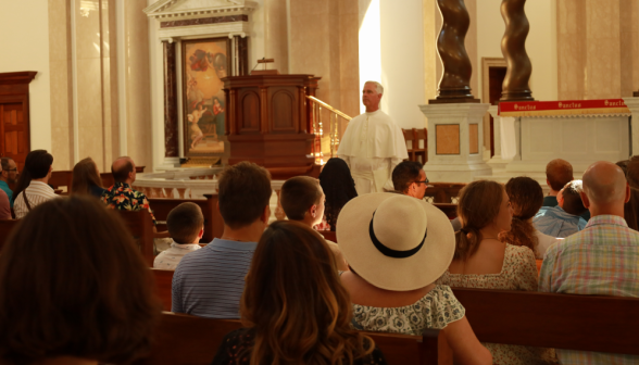 Fr. Walshe speaks in the Chapel