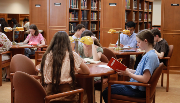 Students study at tables