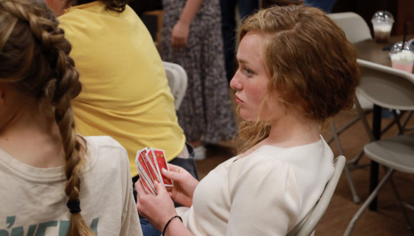 A student plays Apples to Apples