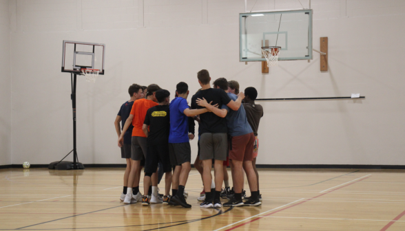 One team huddles