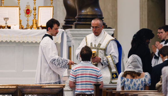 Fr. Marczewski distributes communion