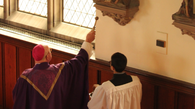 Bishop Byrne blesses the Stations of the Cross