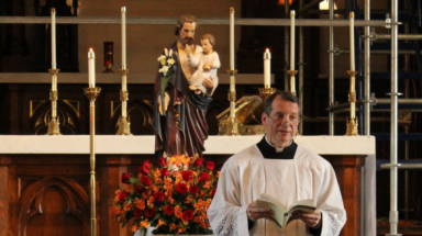 Fr. Markey with. St. Joseph statue