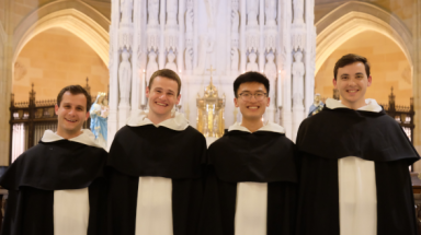 Four new novices in their Dominican habits