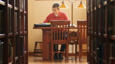 Student in library -- Kiplinger 2015 Image