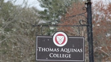New England campus sign during the winter (2018)