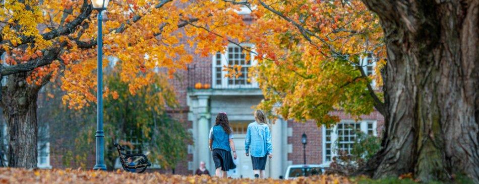 Girls walking toward Gould Hall.