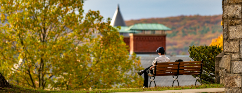 NE student sitting on bench